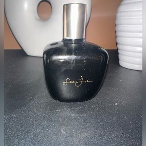 Unforgivable 2.6 oz bottle (used) see pics